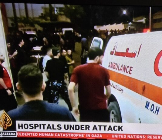 A Gaza ambulance . . . a besieged city and its hospitals overwhelmed by the continuous Israeli bombing