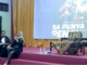 Latifah Anum Siregar, director of the Alliance for Democracy for Papua (right), speaks
