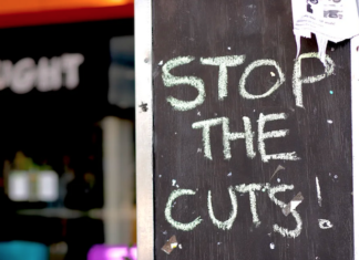 "Stop the cuts"