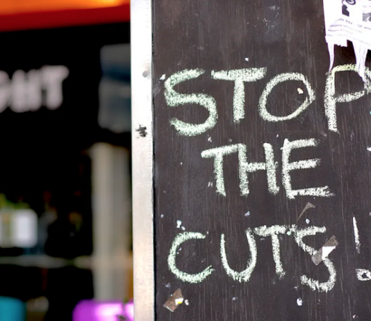 "Stop the cuts"