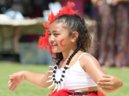A graceful young Melanesian dancer shares her culture