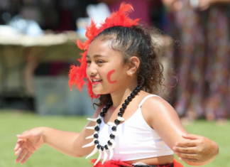 A graceful young Melanesian dancer shares her culture