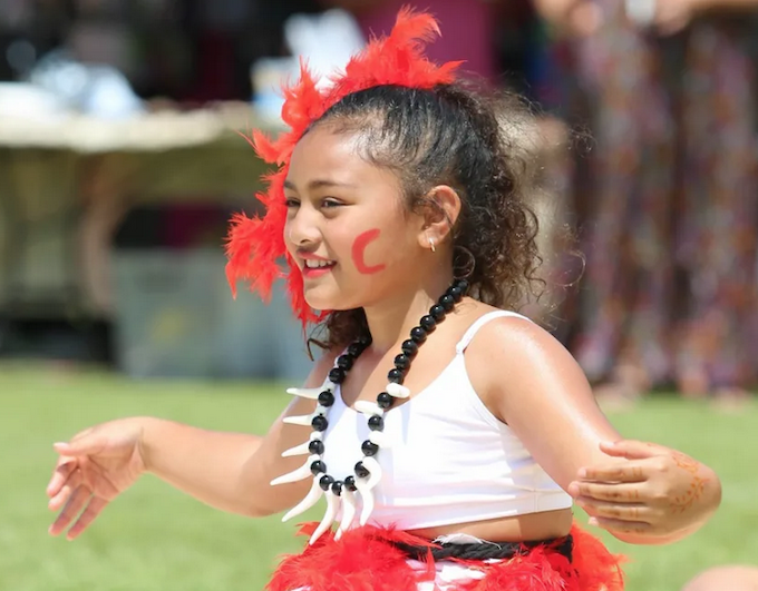 A graceful young Melanesian dancer shares her culture