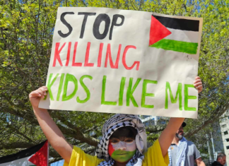 One of the many children taking part in today's solidarity rally for Palestine