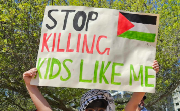 One of the many children taking part in today's solidarity rally for Palestine