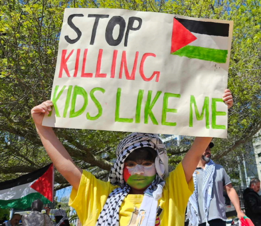 One of the many children taking part in today's solidarity rally for Palestine