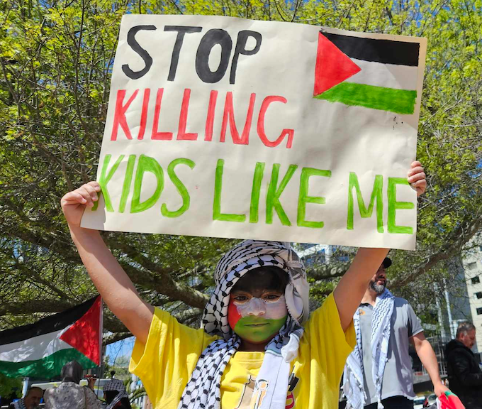 One of the many children taking part in today's solidarity rally for Palestine
