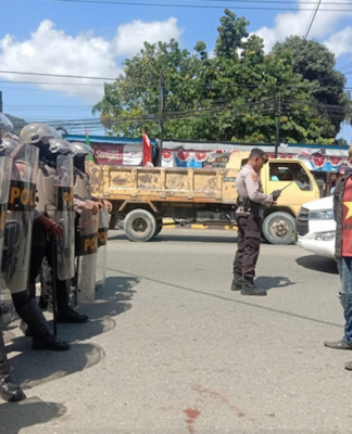 A protest by Papuan activists is blocked around the anniversary of the 1962 New York Agreement in August 2023
