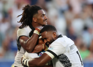 Vinaya Habosi of Fiji celebrates scoring