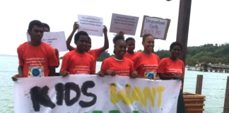 "Climate justice now" protesters in Port Vila