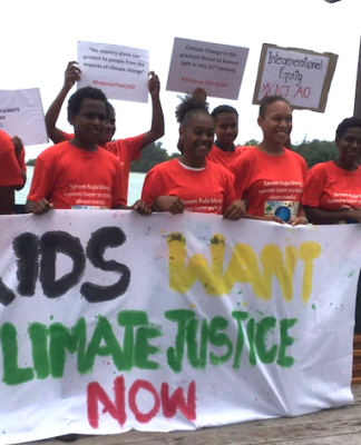 "Climate justice now" protesters in Port Vila