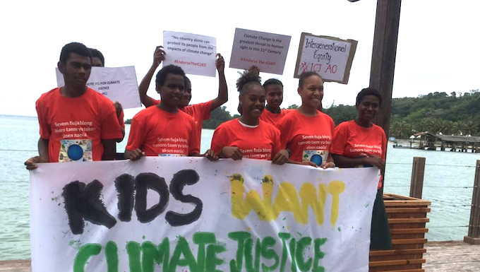 "Climate justice now" protesters in Port Vila