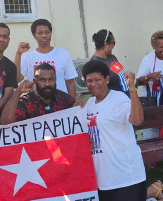 Piango Pacific activists in Fiji prepare their Morning Star flags