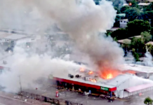 Rioters set fire to this store in Port Moresby