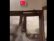 A freak wave smashes through doors at the Roi-Namur space tracking facility