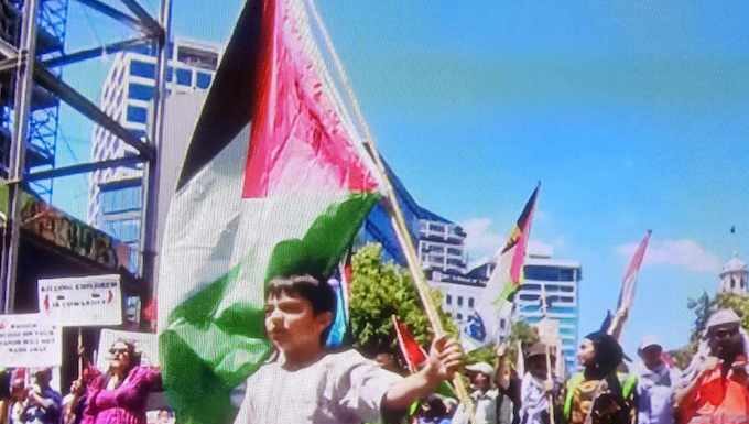 Seven-year-old Ali leads a pro-Palestine march
