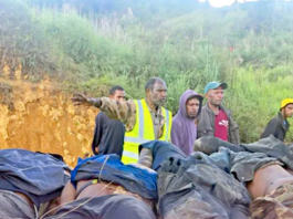 Horror . . . the bodies of tribesmen killed in Wapenamanda