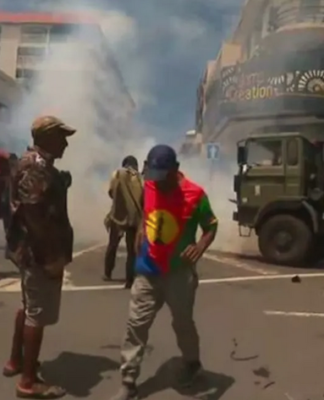 French police fire teargas during clashes with Union Calédonienne pro-independence protesters in central Nouméa