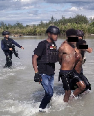 The two Papuan teens arrested by the Indonesian military