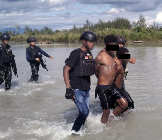 The two Papuan teens arrested by the Indonesian military