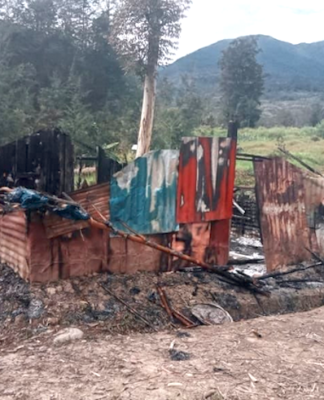 A burnt out Papuan home in Puncak regency