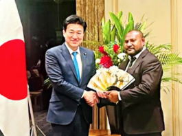 PNG's Defence Minister Dr Billy Joseph (right) being welcomed in Tokyo