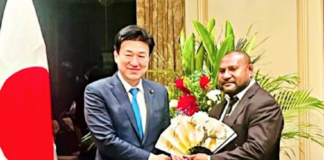 PNG's Defence Minister Dr Billy Joseph (right) being welcomed in Tokyo