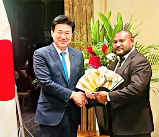 PNG's Defence Minister Dr Billy Joseph (right) being welcomed in Tokyo