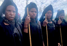 Highlands women attend a funeral for a victim of a sorcery accusation-related attack