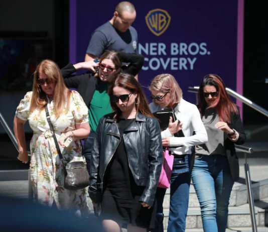 Newshub staff leaving a meeting on Wednesday