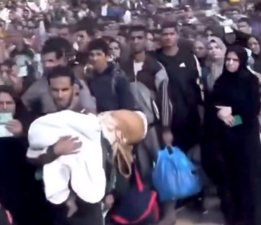 Starving Gazans waiting for scarce humanitarian aid