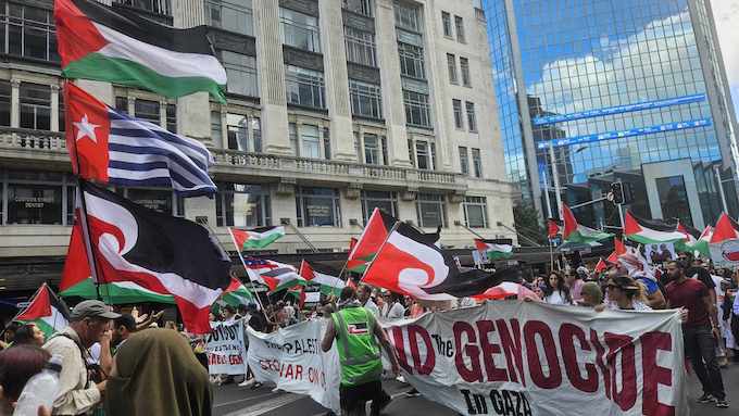 The Palestinian and West Papuan flags flying high