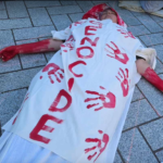 One of the about 20 mock bodies in the Gaza die-in at Te Komititanga Square today