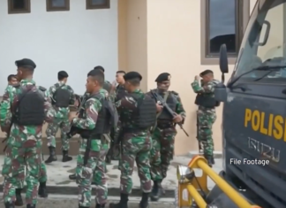 Indonesian security forces preparing to crush a peaceful Papuan demonstration
