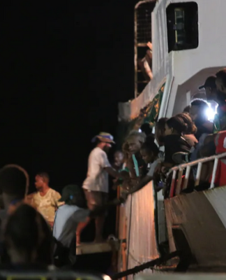 Solomon Islands voters board the MV Taimareho 1