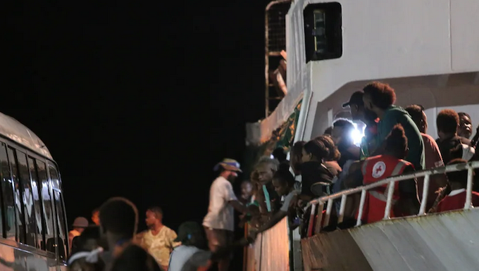 Solomon Islands voters board the MV Taimareho 1