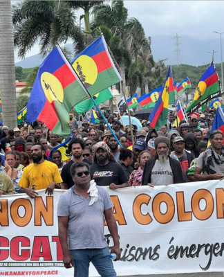 "No to neocolonialism" say Christian Tein of the protest group CCAT and thousands of Kanak protesters