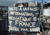 A message to the news media among the charred Nouméa protest debris