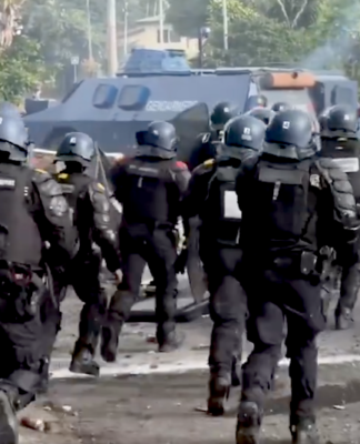 A French gendarme mobile force unit in a "mopping up" operation in Nouméa