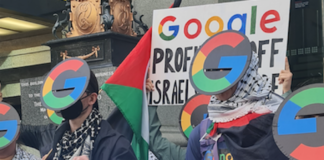 Protesters wave "Google drop Project Nimbus" placards