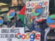 Protesters wave "Google drop Project Nimbus" placards