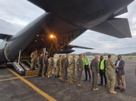 The NZ pilot and humanitarian relief crew being welcomed to Jackson's International Airport