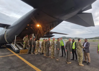 The NZ pilot and humanitarian relief crew being welcomed to Jackson's International Airport