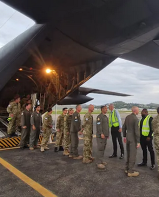 The NZ pilot and humanitarian relief crew being welcomed to Jackson's International Airport