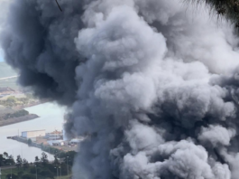 A Nouméa factory burns after last night's rioting followed a day of pro-independence protests in New Caledonia