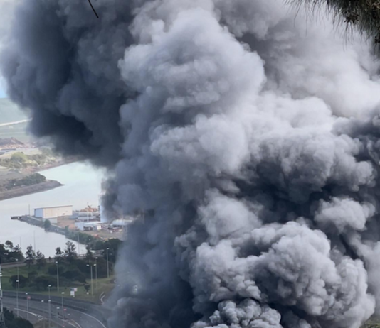 A Nouméa factory burns after last night's rioting followed a day of pro-independence protests in New Caledonia