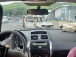 The burnt out remains of a car seen near the University of Caledonia