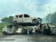 Piled up . . . burnt out cars block a road near Nouméa