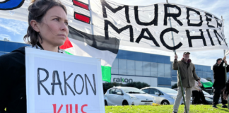 Protesters outside the offices of the electronics manufacturer Rakon