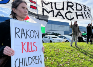 Protesters outside the offices of the electronics manufacturer Rakon